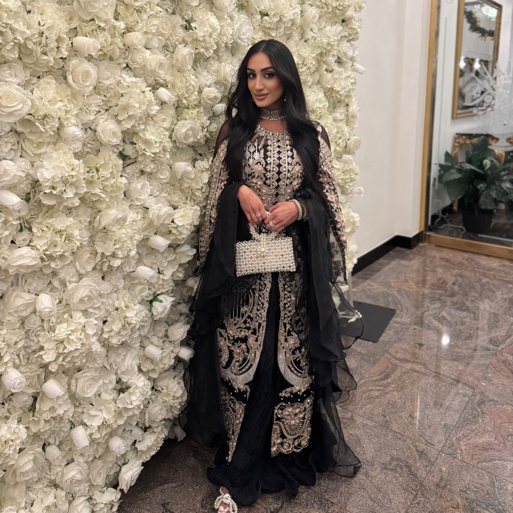 Shiza Hassan black suit long kameez with butterfly sleeve and ruffle pants